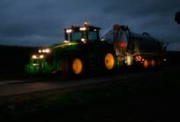 AMS: John Deere tractor at night